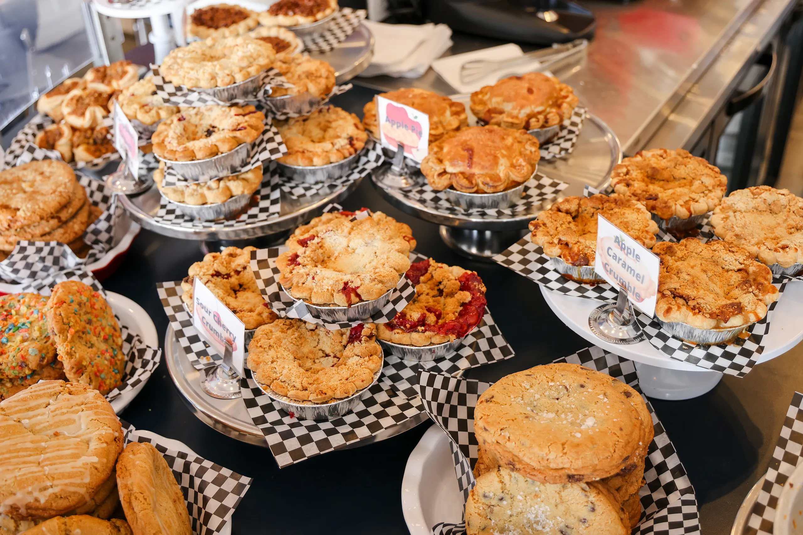 a picture of many baked goods, cookies, tarts, scones at the Langley tour.