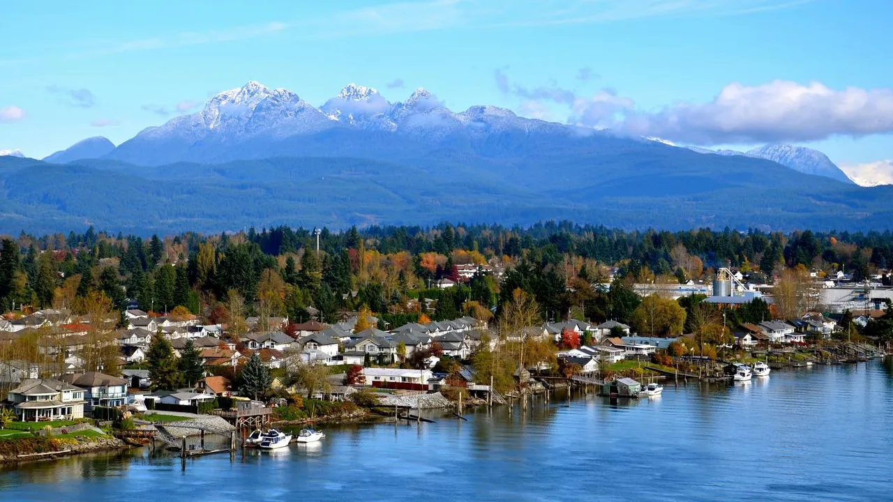 Maple Ridge riverside community with the mountains in the background.